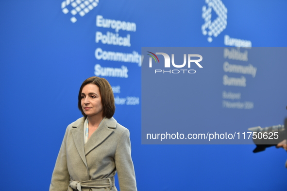 Maia Sandu, President of Moldova, is greeted by Viktor Orban, Hungarian Prime Minister, before the 5th European Political Community Summit i...