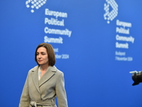 Maia Sandu, President of Moldova, is greeted by Viktor Orban, Hungarian Prime Minister, before the 5th European Political Community Summit i...