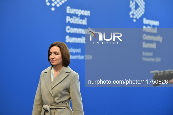 Maia Sandu, President of Moldova, is greeted by Viktor Orban, Hungarian Prime Minister, before the 5th European Political Community Summit i...