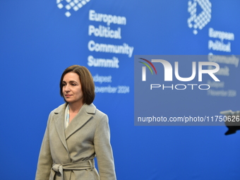 Maia Sandu, President of Moldova, is greeted by Viktor Orban, Hungarian Prime Minister, before the 5th European Political Community Summit i...