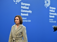 Maia Sandu, President of Moldova, is greeted by Viktor Orban, Hungarian Prime Minister, before the 5th European Political Community Summit i...