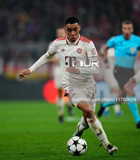 Jamal Musiala of Bayern Munich  controls the ball during the Champions League Round 4 match between Bayern Munich v Benfica at the Allianz a...