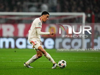 Jamal Musiala of Bayern Munich  controls the ball during the Champions League Round 4 match between Bayern Munich v Benfica at the Allianz a...