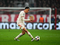 Jamal Musiala of Bayern Munich  controls the ball during the Champions League Round 4 match between Bayern Munich v Benfica at the Allianz a...