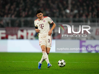 Min-jae Kim of Bayern Munich  controls the ball during the Champions League Round 4 match between Bayern Munich v Benfica at the Allianz are...