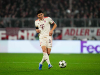 Min-jae Kim of Bayern Munich  controls the ball during the Champions League Round 4 match between Bayern Munich v Benfica at the Allianz are...