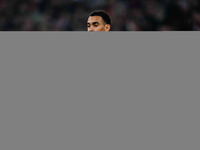 Jamal Musiala of Bayern Munich  looks on during the Champions League Round 4 match between Bayern Munich v Benfica at the Allianz arena, Mun...