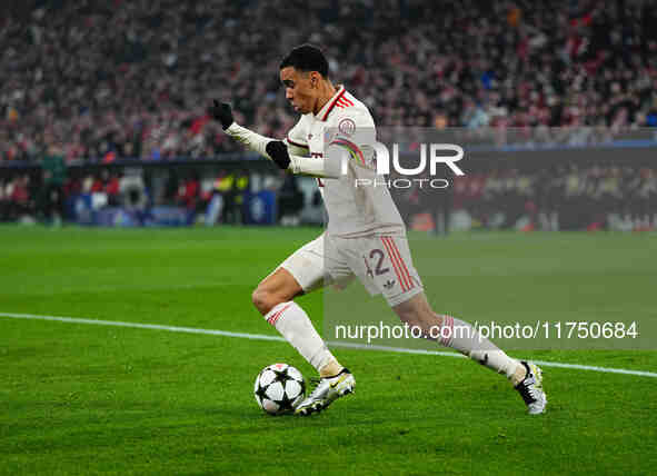 Jamal Musiala of Bayern Munich  looks on during the Champions League Round 4 match between Bayern Munich v Benfica at the Allianz arena, Mun...