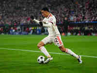 Jamal Musiala of Bayern Munich  looks on during the Champions League Round 4 match between Bayern Munich v Benfica at the Allianz arena, Mun...