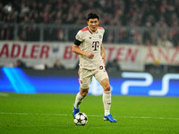 Min-jae Kim of Bayern Munich  controls the ball during the Champions League Round 4 match between Bayern Munich v Benfica at the Allianz are...