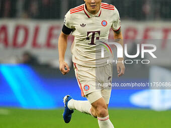 Min-jae Kim of Bayern Munich  controls the ball during the Champions League Round 4 match between Bayern Munich v Benfica at the Allianz are...