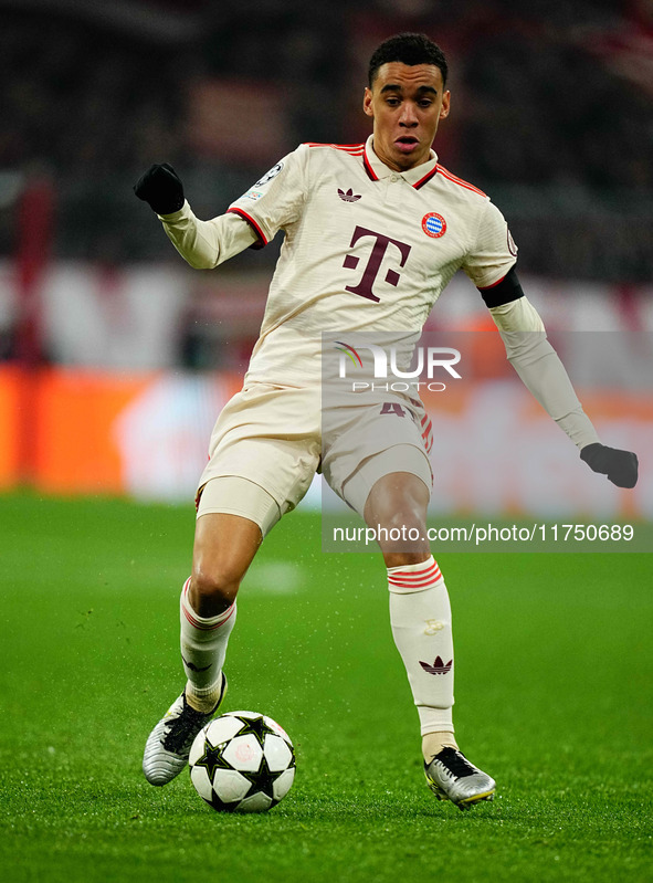 Jamal Musiala of Bayern Munich  controls the ball during the Champions League Round 4 match between Bayern Munich v Benfica at the Allianz a...