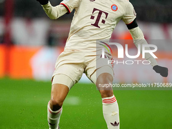 Jamal Musiala of Bayern Munich  controls the ball during the Champions League Round 4 match between Bayern Munich v Benfica at the Allianz a...