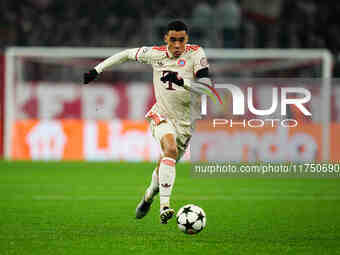 Jamal Musiala of Bayern Munich  controls the ball during the Champions League Round 4 match between Bayern Munich v Benfica at the Allianz a...