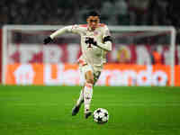 Jamal Musiala of Bayern Munich  controls the ball during the Champions League Round 4 match between Bayern Munich v Benfica at the Allianz a...