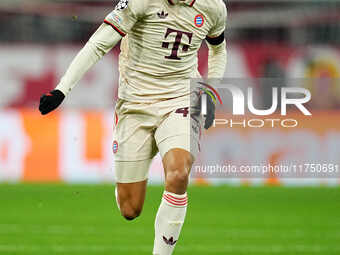 Jamal Musiala of Bayern Munich  controls the ball during the Champions League Round 4 match between Bayern Munich v Benfica at the Allianz a...