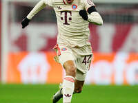 Jamal Musiala of Bayern Munich  controls the ball during the Champions League Round 4 match between Bayern Munich v Benfica at the Allianz a...