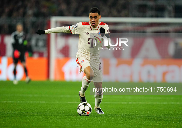 Jamal Musiala of Bayern Munich  controls the ball during the Champions League Round 4 match between Bayern Munich v Benfica at the Allianz a...