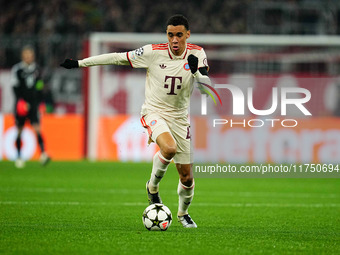 Jamal Musiala of Bayern Munich  controls the ball during the Champions League Round 4 match between Bayern Munich v Benfica at the Allianz a...