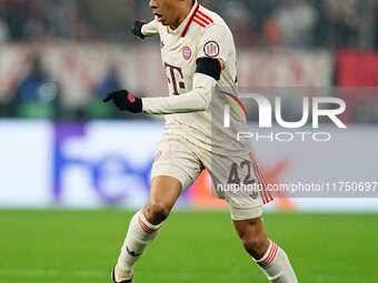 Jamal Musiala of Bayern Munich  controls the ball during the Champions League Round 4 match between Bayern Munich v Benfica at the Allianz a...