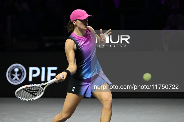 RIYADH, SAUDI ARABIA - NOVEMBER 07: Iga Swiatek of Poland during her match against Daria Kasatkina, on Day 6 of the 2024 WTA Finals, part of...