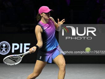 RIYADH, SAUDI ARABIA - NOVEMBER 07: Iga Swiatek of Poland during her match against Daria Kasatkina, on Day 6 of the 2024 WTA Finals, part of...