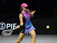 RIYADH, SAUDI ARABIA - NOVEMBER 07: Iga Swiatek of Poland during her match against Daria Kasatkina, on Day 6 of the 2024 WTA Finals, part of...