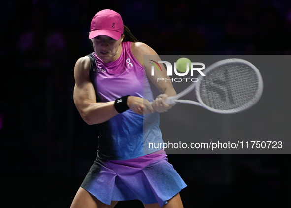 RIYADH, SAUDI ARABIA - NOVEMBER 07: Iga Swiatek of Poland during her match against Daria Kasatkina, on Day 6 of the 2024 WTA Finals, part of...