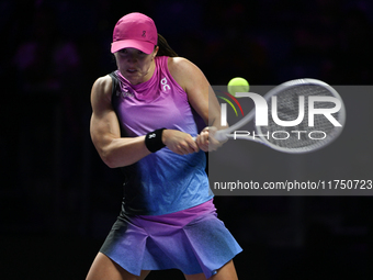 RIYADH, SAUDI ARABIA - NOVEMBER 07: Iga Swiatek of Poland during her match against Daria Kasatkina, on Day 6 of the 2024 WTA Finals, part of...