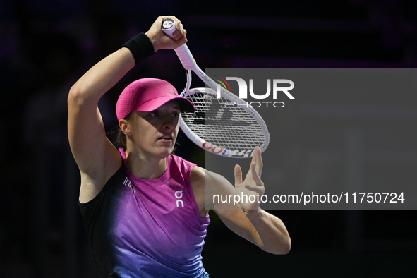 RIYADH, SAUDI ARABIA - NOVEMBER 07: Iga Swiatek of Poland during her match against Daria Kasatkina, on Day 6 of the 2024 WTA Finals, part of...