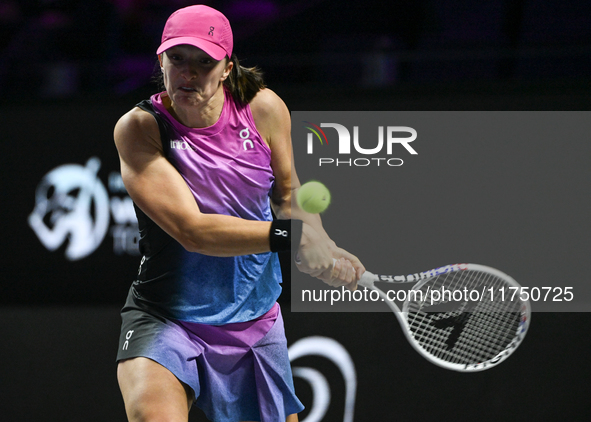 RIYADH, SAUDI ARABIA - NOVEMBER 07: Iga Swiatek of Poland during her match against Daria Kasatkina, on Day 6 of the 2024 WTA Finals, part of...