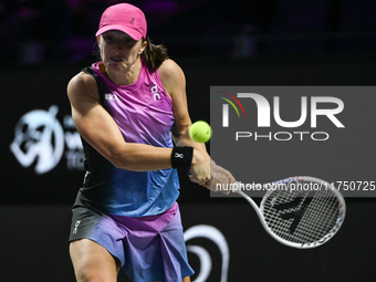 RIYADH, SAUDI ARABIA - NOVEMBER 07: Iga Swiatek of Poland during her match against Daria Kasatkina, on Day 6 of the 2024 WTA Finals, part of...