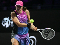 RIYADH, SAUDI ARABIA - NOVEMBER 07: Iga Swiatek of Poland during her match against Daria Kasatkina, on Day 6 of the 2024 WTA Finals, part of...