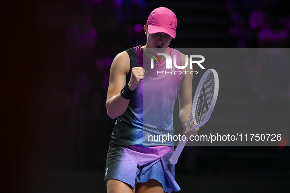 RIYADH, SAUDI ARABIA - NOVEMBER 07: Iga Swiatek of Poland during her match against Daria Kasatkina, on Day 6 of the 2024 WTA Finals, part of...