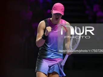 RIYADH, SAUDI ARABIA - NOVEMBER 07: Iga Swiatek of Poland during her match against Daria Kasatkina, on Day 6 of the 2024 WTA Finals, part of...