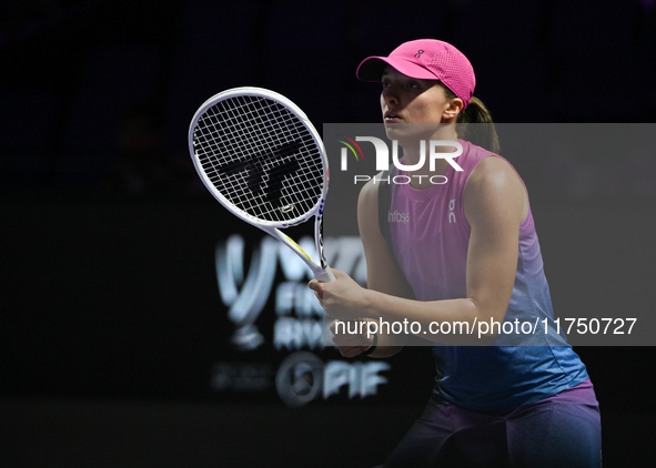 RIYADH, SAUDI ARABIA - NOVEMBER 07: Iga Swiatek of Poland during her match against Daria Kasatkina, on Day 6 of the 2024 WTA Finals, part of...