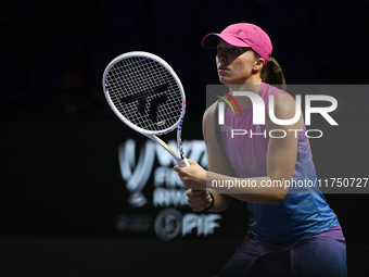 RIYADH, SAUDI ARABIA - NOVEMBER 07: Iga Swiatek of Poland during her match against Daria Kasatkina, on Day 6 of the 2024 WTA Finals, part of...