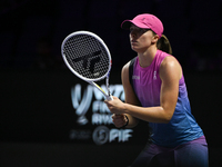 RIYADH, SAUDI ARABIA - NOVEMBER 07: Iga Swiatek of Poland during her match against Daria Kasatkina, on Day 6 of the 2024 WTA Finals, part of...