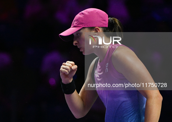 RIYADH, SAUDI ARABIA - NOVEMBER 07: Iga Swiatek of Poland during her match against Daria Kasatkina, on Day 6 of the 2024 WTA Finals, part of...