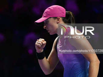 RIYADH, SAUDI ARABIA - NOVEMBER 07: Iga Swiatek of Poland during her match against Daria Kasatkina, on Day 6 of the 2024 WTA Finals, part of...