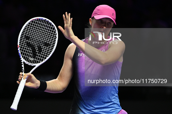 RIYADH, SAUDI ARABIA - NOVEMBER 07: Iga Swiatek of Poland during her match against Daria Kasatkina, on Day 6 of the 2024 WTA Finals, part of...