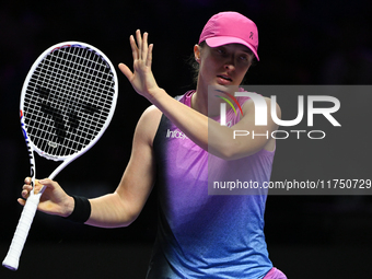 RIYADH, SAUDI ARABIA - NOVEMBER 07: Iga Swiatek of Poland during her match against Daria Kasatkina, on Day 6 of the 2024 WTA Finals, part of...