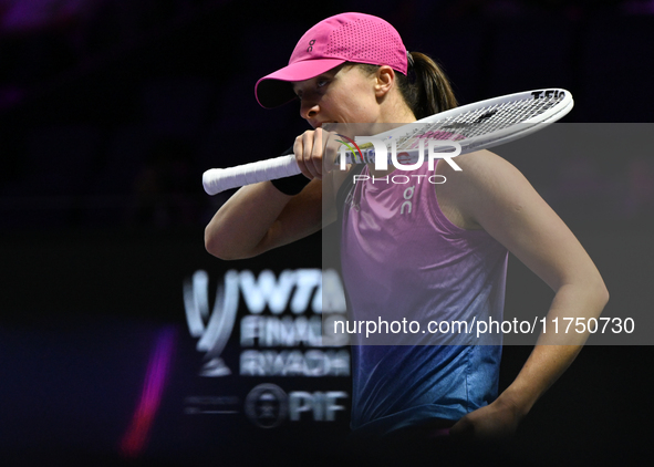 RIYADH, SAUDI ARABIA - NOVEMBER 07: Iga Swiatek of Poland during her match against Daria Kasatkina, on Day 6 of the 2024 WTA Finals, part of...