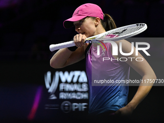 RIYADH, SAUDI ARABIA - NOVEMBER 07: Iga Swiatek of Poland during her match against Daria Kasatkina, on Day 6 of the 2024 WTA Finals, part of...