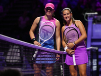 RIYADH, SAUDI ARABIA - NOVEMBER 07: Iga Swiatek (L) of Poland pose for a photo with Daria Kasatkina (R), on Day 6 of the 2024 WTA Finals, pa...