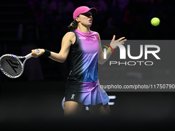 RIYADH, SAUDI ARABIA - NOVEMBER 07: Iga Swiatek of Poland during her match against Daria Kasatkina, on Day 6 of the 2024 WTA Finals, part of...