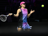 RIYADH, SAUDI ARABIA - NOVEMBER 07: Iga Swiatek of Poland during her match against Daria Kasatkina, on Day 6 of the 2024 WTA Finals, part of...