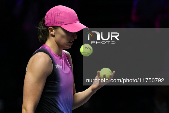 RIYADH, SAUDI ARABIA - NOVEMBER 07: Iga Swiatek of Poland during her match against Daria Kasatkina, on Day 6 of the 2024 WTA Finals, part of...