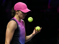 RIYADH, SAUDI ARABIA - NOVEMBER 07: Iga Swiatek of Poland during her match against Daria Kasatkina, on Day 6 of the 2024 WTA Finals, part of...