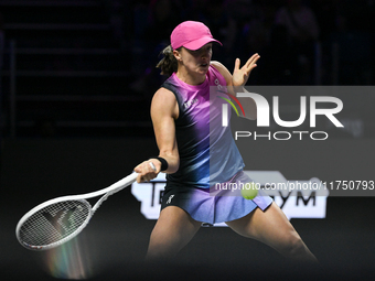 RIYADH, SAUDI ARABIA - NOVEMBER 07: Iga Swiatek of Poland during her match against Daria Kasatkina, on Day 6 of the 2024 WTA Finals, part of...